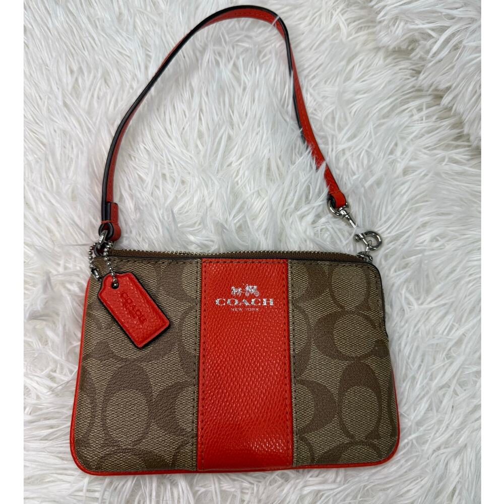COACH Brown orange Zip Wristlet